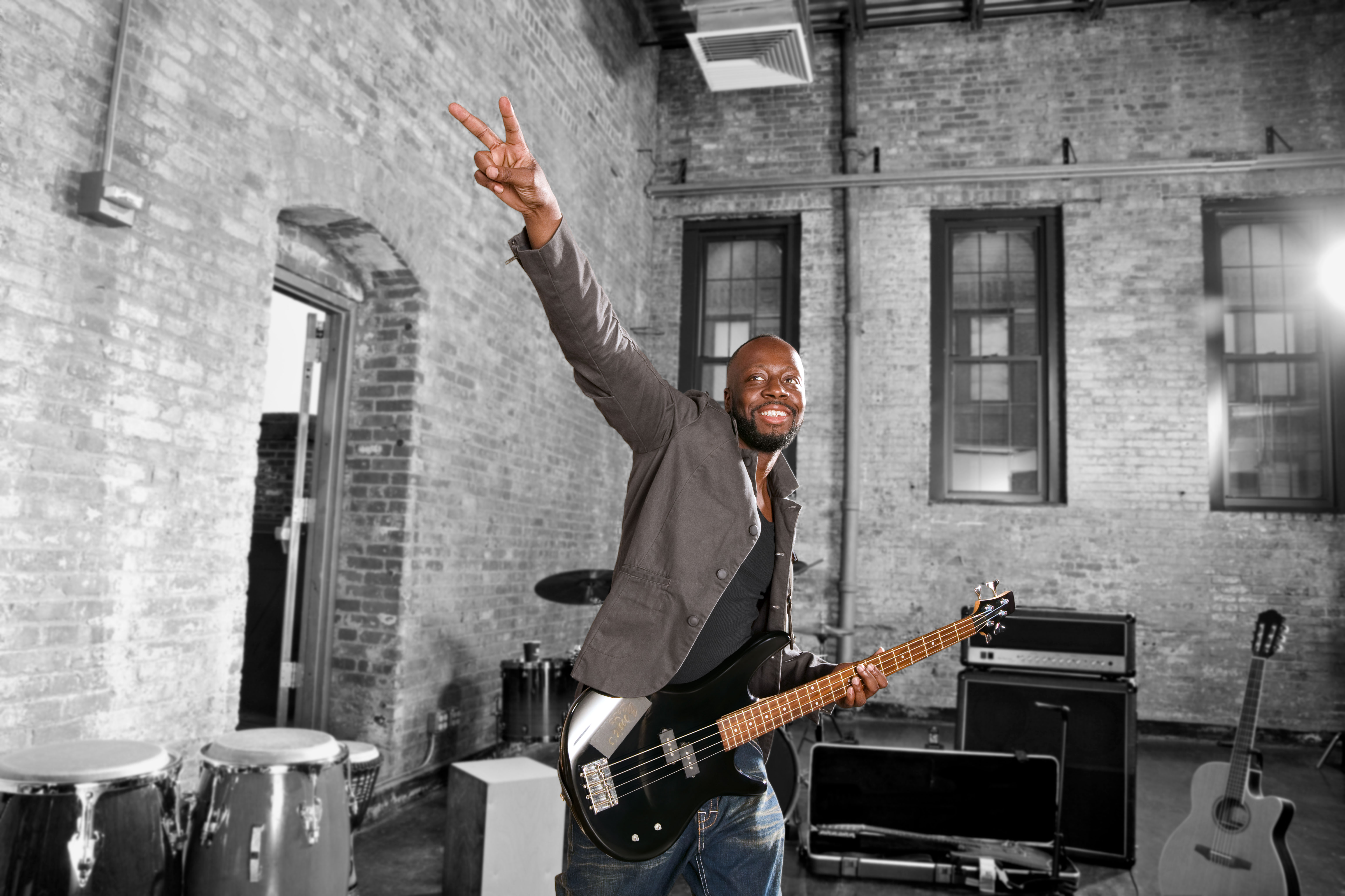 Voilà campaign photography: Wyclef Jean with guitar